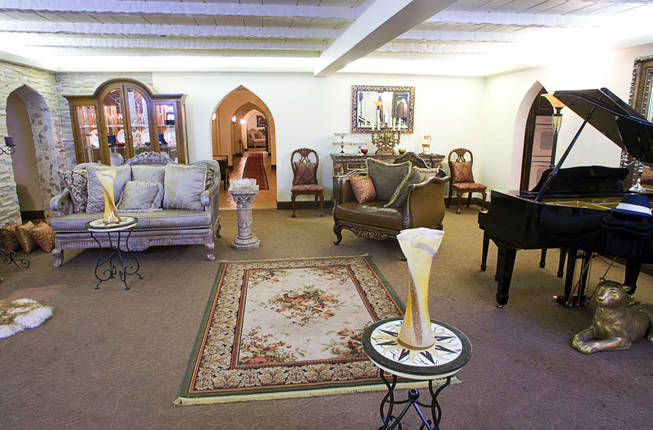 The living room is shown at Castle Rancho in Rancho Circle Wednesday, August 25, 2010. The home was originally made to look like a castle by the owners of the Coin Castle Casino but in later years the home fell into disrepair. Recently the home is currently being restored, expanded and modernized.