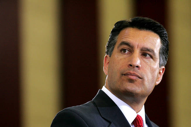 Brian Sandoval listens to Rory Reid during a debate on education between the gubernatorial candidates Sunday, August 29, 2010.