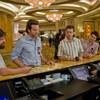 "The Hangover" actors, from left, Zach Galifianakis, Bradley Cooper, Ed Helms and Justin Bartha, appear in a scene at Caesars Palace's reception area.