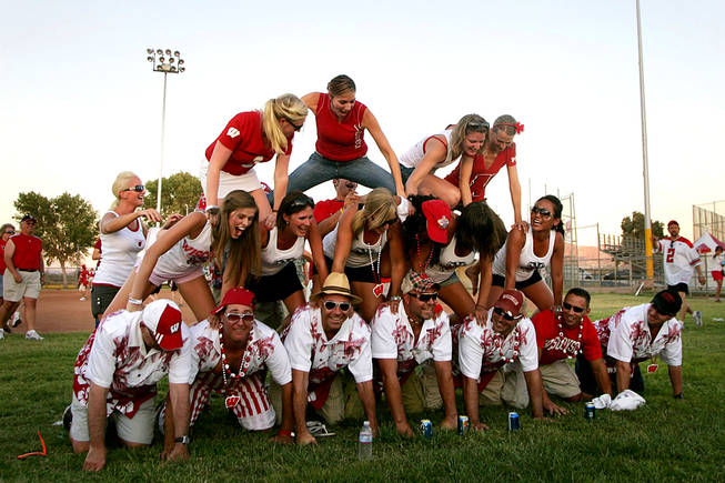 Wisconsin fans make a human pyramid at a tailgate party before their season opening game against UNLV on Saturday, September 9, 2010 at Sam Boyd Stadium.