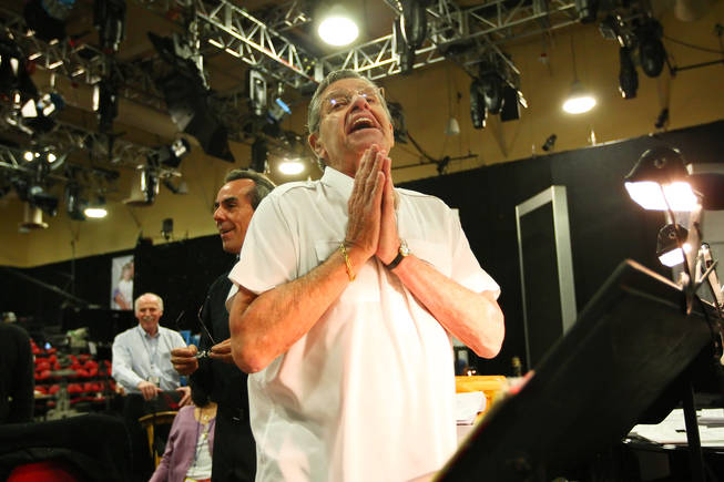 Jerry Lewis begs his band to play a humorous melody for him comprised of random notes during rehearsal for the 45th Annual Jerry Lewis MDA Labor Day Telethon Sunday night at the South Point.  This year's telethon hopes to raise $70 million to surpass 2009's earnings of $60 million in the fight against muscular dystrophy.