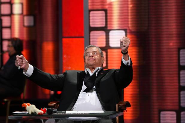 Jerry Lewis celebrates a new tally during the final hour ...