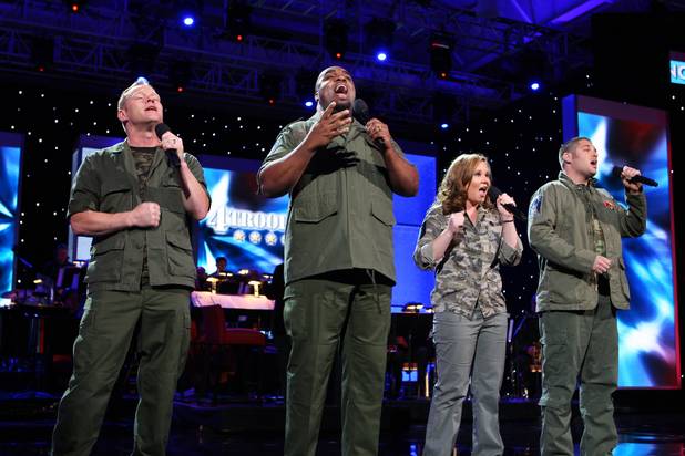 4Troops perform a patriotic number Monday afternoon during the final ...