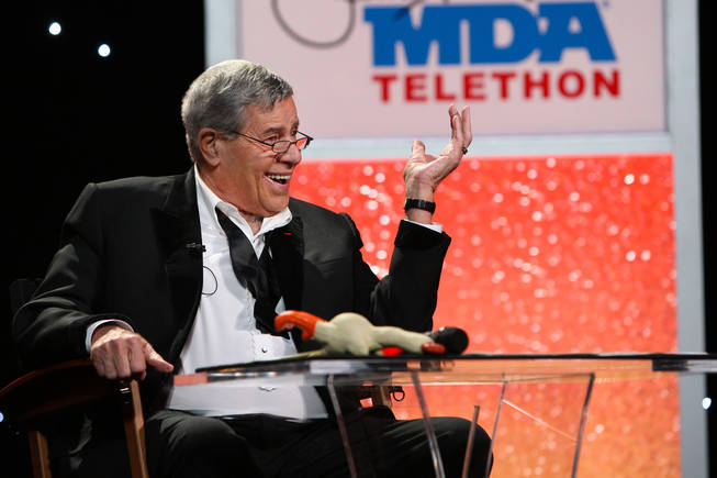 With a rubber chicken laying next to him on the table, Jerry Lewis continues to crack jokes Monday afternoon during the 20th hour of the 45th Annual Jerry Lewis MDA Labor Day Telethon at South Point.