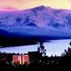 A sunset is shown on the south shore of Lake Tahoe in Nevada showing the Montbleu casino and spa in the foreground.