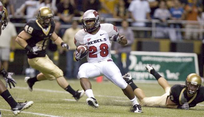 UNLV's Bradley Randle (28) cuts upfield during a second quarter kick return against Idaho on Saturday at the Kibbie Dome in Moscow, Idaho. The Rebels fell to the Vandals, 30-7, dropping to 0-3 on the season.