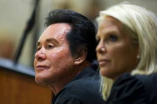 Entertainer Wayne Newton and his wife Kathleen listen to homeowner's concerns during a meeting at the La Quinta Inn Monday, September 20, 2010. Newton hosted the neighborhood meeting to discuss development plans that would include tours on his property.