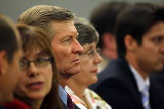 Bill Scott, Erik Scott's father, listens to testimony during a coroner's inquest at the Regional Justice Center Wednesday, September 22, 2010. 