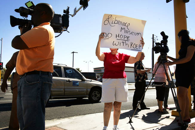 The local media capture the protest against the closing of the Liberace Museum in front of the museum in Las Vegas Wednesday, September 22, 2010.