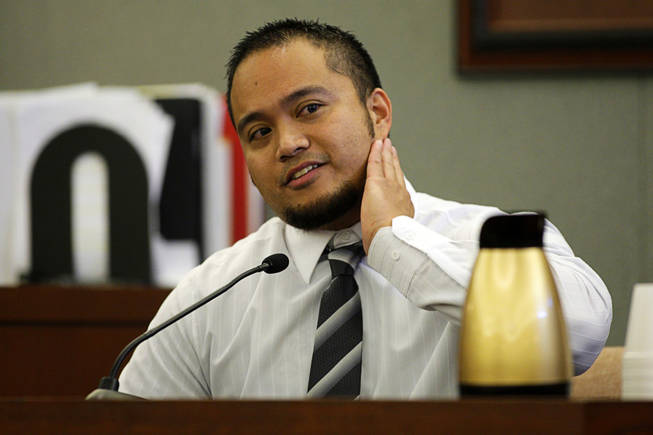 Jerome Dwight Arcano, a Costco employee, testifies during a coroner's inquest for Erik Scott at the Regional Justice Center Friday, September 24, 2010. Arcano said he thought Scott might be on drugs. 