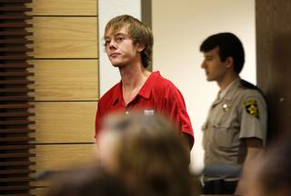 Russell Sean Hultgren, 19, arrives for his initial arraignment at Henderson Justice Court Tuesday, October 5, 2010. Hultgren was arraigned on seven felony charges, including murder with a deadly weapon and arson, in connection with the drug-related shooting death of Andrew Duarte.