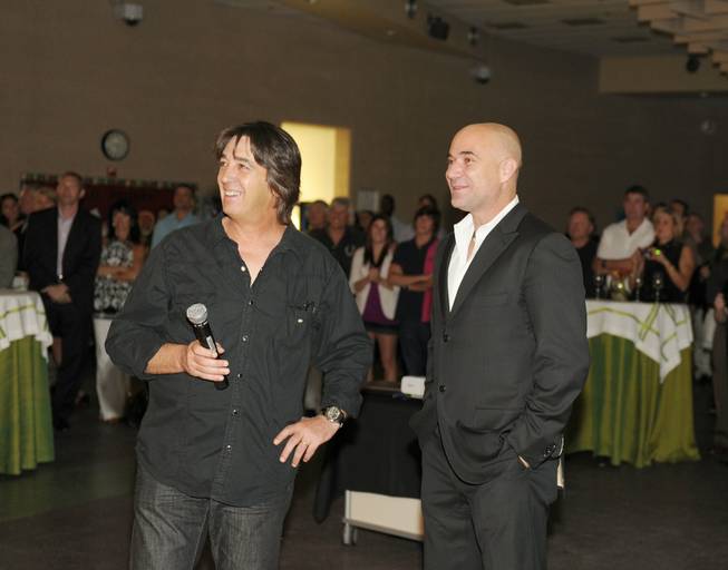 Artist Loppo Martinez and Andre Agassi at the 2010 Andre ...