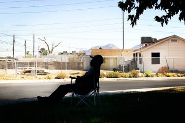 Curtiss Lewis, Sr. relaxes in Lubertha Johnson Park Monday, October 11, 2010 in the Las Vegas neighborhood bordered by Carey Avenue to the north, Lake Mead Boulevard to the south, Revere Street to the east and Comstock Drive to the west. The neighborhood was named the third worst neighborhood in America by the website WalletPop.