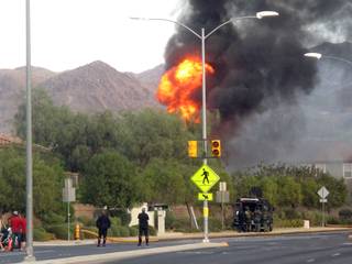 Henderson police and fire departments responded to a fire at a home on Hyssop Court Friday afternoon. Police believe a 39-year-old man who barricaded himself in his estranged wife's house and threatened to shoot police offiicers started the fire. He was rescued by firefighters and transported to Sunrise Hospital.