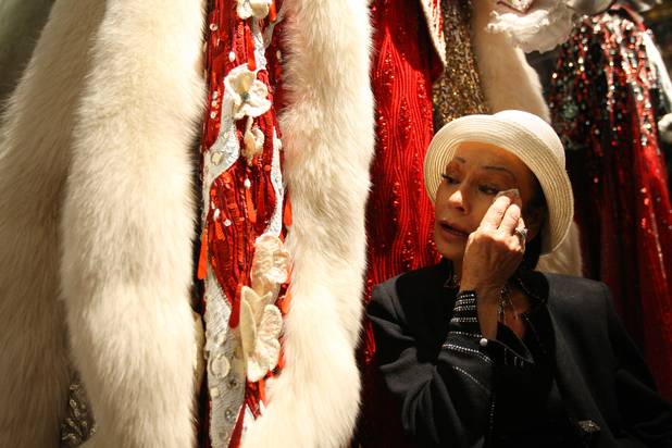 Overwhelmed with sadness, Anna Nateece, who designed Liberace's infamous furs, dabs her eyes during the final day of business at the Liberace Museum Sunday.