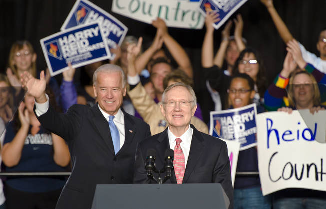 Vice President Joe Biden and U.S. Senator Harry Reid greet supporters during a support rally for the Democratic Senate Majority Leader at the University of Nevada, Reno campus Wednesday, Oct. 20, 2010.