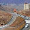 Traffic travels on the new approach road after the Mike O'Callaghan-Pat Tillman Memorial Bridge opened Wednesday, October 20, 2010.
