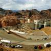 The recently opened Mike O'Callaghan-Pat Tillman Memorial Bridge can be seen in the upper left as the sun peeks through on the Hoover Dam Wednesday, October 20, 2010.