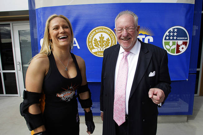 Katie "The Force" Claessens of the Fabulous Sin City Rollergirls poses with Las Vegas Mayor Oscar Goodman during a ceremony marking the completion of the Bonneville Transit Center in downtown Las Vegas Monday, October 25, 2010. The Rollergirls gave Goodman a Rollergirls' nickname - "80 Proof." The facility will serve as the central hub for the RTC's transit services, including the Strip & Downtown Express, the Deuce on the Strip, Centennial Express, MAX and 12 other routes.