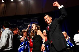 Brian Sandoval enters the Red Rock Resort ballroom holding his daughter Madeline's hand after it was announced he defeated Rory Reid for governor Tuesday.