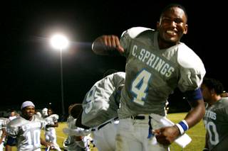 Canyon Springs running back Malik Brown celebrates their win over Silverado during their playoff game Friday, November 5, 2010. Canyon Springs won 20-17 to advance.