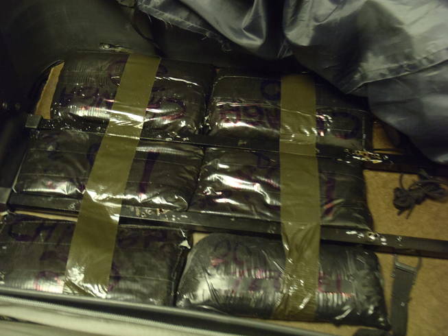 Police say about $1 million in black tar heroin was contained in luggage that was seized at McCarran International Airport. 