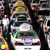 Cabs wait in line to pick up passengers coming into McCarran Airport Monday, November 8, 2010.