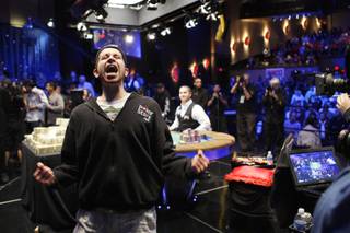 Jonathan Duhamel of Canada celebrates after beating John Racener in the finals of the World Series of Poker Main Event at the Rio on Monday, November 8, 2010. Duhamel won the championship bracelet and $8.9 million in prize money. 