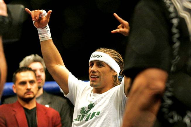 Urijah Faber celebrates his win over Takeya Mizugaki during their bout at WEC 52 Thursday, November 11, 2010 at the Palms.