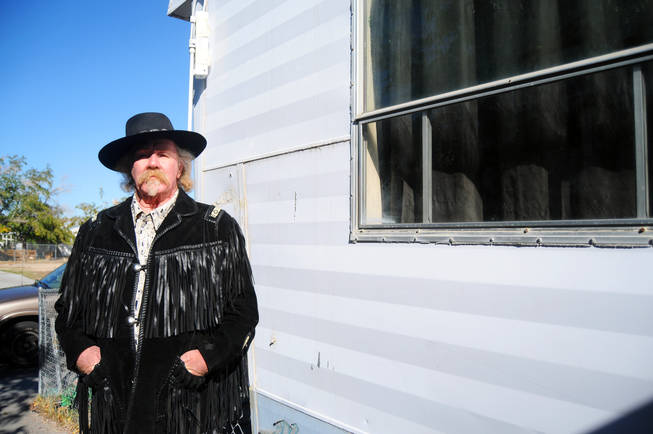 Wyatt Earp, 67, lives in a 1950s-era trailer home in the Tropicana Village Mobile Home Park in Spring Valley. Earp says he would not be able to move his trailer to another mobile home park due to community standards at area parks, which restrict the age of incoming homes. 