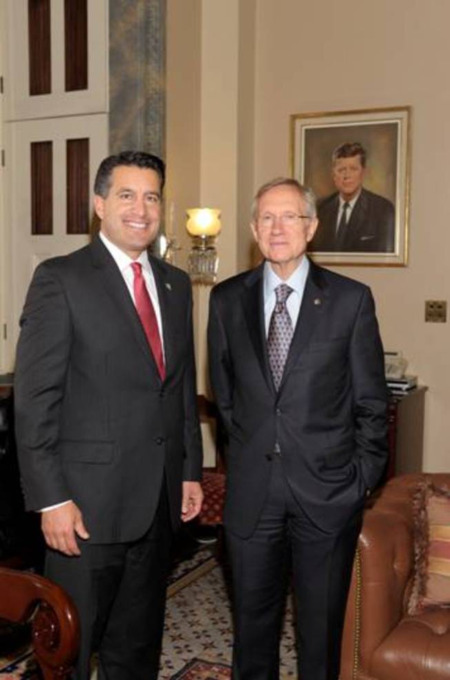 Senate Majority Leader Harry Reid and Gov.-elect Brian Sandoval meet in Reid's office.