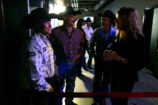 Bareback winner Wes Stevenson waits backstage to be called out to receive his prizes during the Montana Silversmiths Go-Round Buckle Presentations at the South Point Tuesday, December 7, 2010.