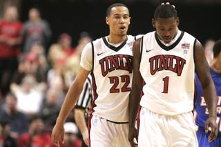 UNLV guard Chace Stanback pats teammate Quintrell Thomas on the head during their game against Boise State at the Orleans Arena Wednesday, December 8, 2010. UNLV held off a late surge to win 75-72 and improve to 9-0.