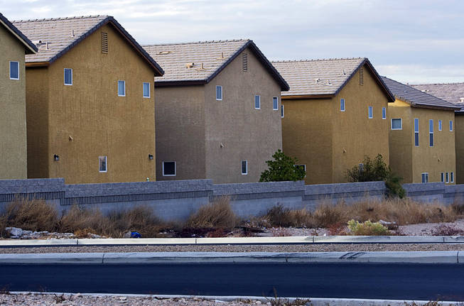 The rear of homes in an a complex in the southwest part of the Valley. "It looks like a third-grade drawing," says architect Robert Fielden. Photographed December 9, 2010.