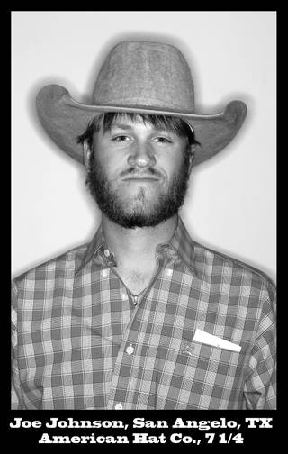 Cowboys at the National Finals Rodeo bear their hat hair Friday, December 10, 2010 at the Thomas & Mack Center.