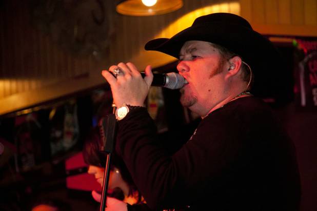 Austin Law rocks the house at Gilley's Saloon & Dance Hall during a night of fun after some serious NFR action Thursday, Dec. 9, 2010.