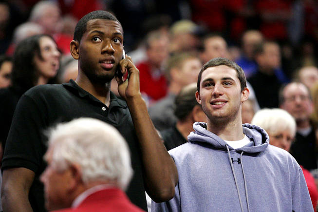 UNLV's Mike Moser, left, takes in the Rebels' game against UC Santa Barbara on Dec. 15, 2010, at the Thomas & Mack Center while hosting UCLA transfer Matt Carlino on an official campus visit.