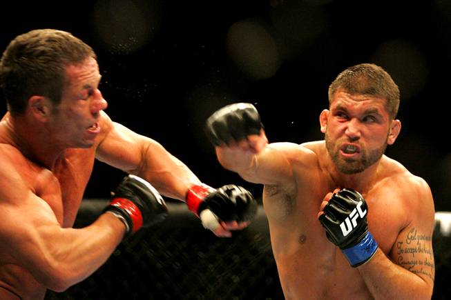 Jeremy Stephens connects on Marcus Davis during their middleweight bout during UFC 125 on Saturday, Jan. 1, 2011, at the MGM Grand Garden Arena.