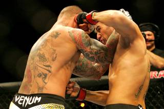 Thiago Silva and Brandon Vera trade punches during their fight at UFC 125 Saturday, January 1, 2011 at the MGM Grand Garden Arena. Silva won by decision.