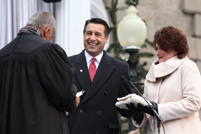 Gov. Brian Sandoval takes the oath of office from Chief Supreme Court Justice Michael Douglas during the inauguration, Jan. 3, 2011 at the Capitol in Carson City. First Lady Kathleen Sandoval is at right.
