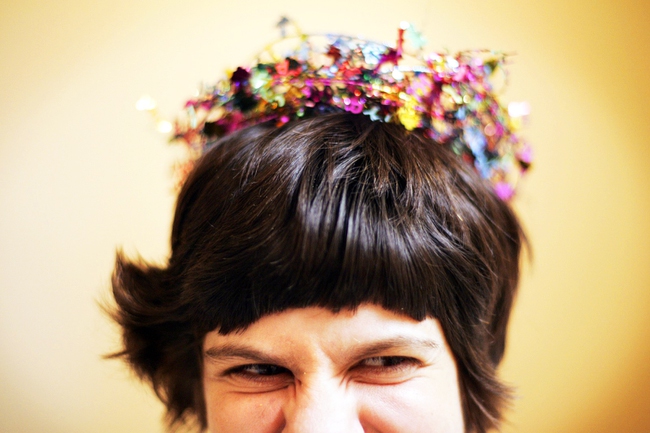 Christina Sablan wears a crown to celebrate her 29th birthday at her apartment with family January 18, 2011. With the help of a state program called Residential Support Services, Christina, who lost the ability to speak after a neurological infection as a baby, lives in her own apartment with supervision.