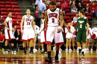 UNLV guard Anthony Marshall heads off the court with his head down after fouling out against Colorado State during a game on Jan. 19, 2011, at the Thomas & Mack Center. Colorado State won, 78-63.
