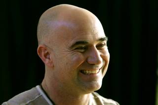 Andre Agassi smiles during an announcement of Agassi's induction into the International Tennis Hall of Fame Thursday, January 20, 2011 at the Andre Agassi College Preparatory Academy. Agassi will be officially inducted July 9th.