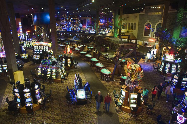 A couple walks though the casino floor at Buffalo Bill's in Primm on Thursday, Jan. 20, 2011. The casino recently replaced older light bulbs with energy-efficient lighting throughout the casino. 