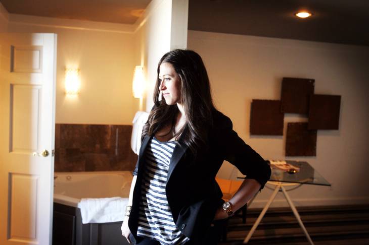 Alexandra Epstein, El Cortez executive manager stands in "The Big Sleep" one of the suites that was redesigned for the Design a Suite Downtown competition at the El Cortez Thursday, January 27, 2011.