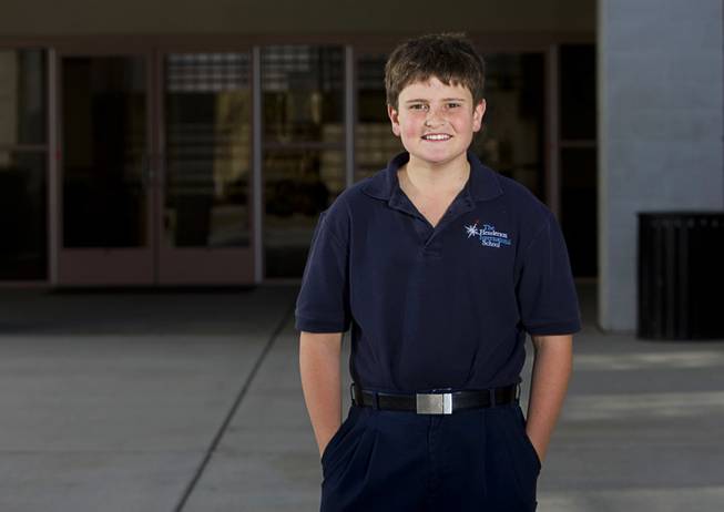 Daniel Capp, a sixth-grader at Henderson International School, poses at the school on Friday, January 28, 2011.