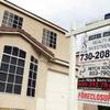 A "for sale" sign is displayed outside a foreclosed home near Hacienda Avenue and Jones Boulevard on Saturday, Feb. 5, 2011.  