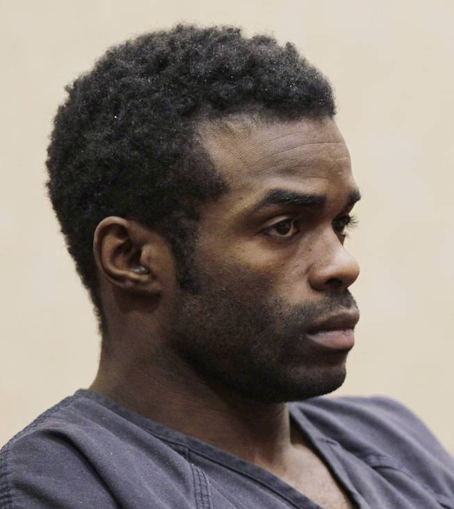 Jason Griffith waits for his arraignment on strangulation and dismemberment charges of 31-year-old Debora Flores Narvaez, a Las Vegas Strip dancer, Wednesday, Jan. 12, 2011 in North Las Vegas. Griffith could face the death penalty.
