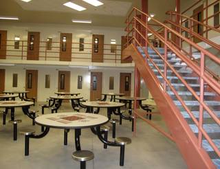 The Henderson Detention Center's housing units are designed to be self-contained so inmates can eat there, access the outdoor recreation area and appear via video for arraignments. The goal is to give inmates a little more freedom and more communication with corrections officers.