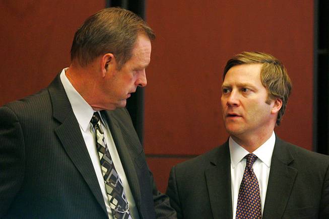 Sens. John Lee, left, and Greg Brower talk before a meeting of the Senate Select Committee on Economic Growth and Employment during the 2011 legislative session, Feb. 9, 2011, in Carson City.
